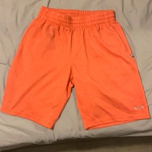 Salmon colored Oakley shorts